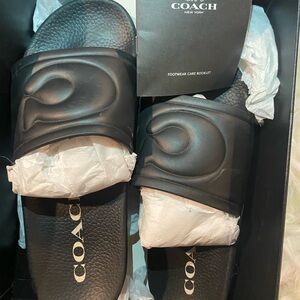Coach women’s Dark Slide Sandals
